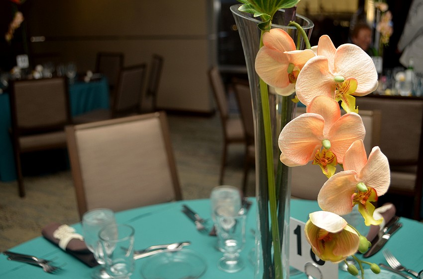 Flower centerpieces adorned each table at Michael’s on the Bay at Selby Gardens for the 6th annual Sunset Soiree.