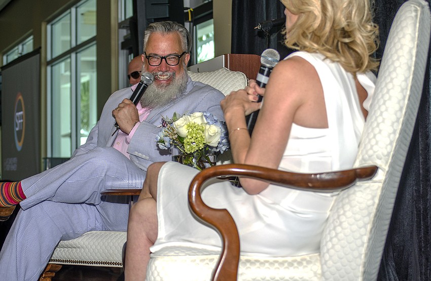 Sarasota Film Festival Creative Director Michael Dunaway laughs at Rory Kennedy'  s response to a question during the Q&A portion of the event.