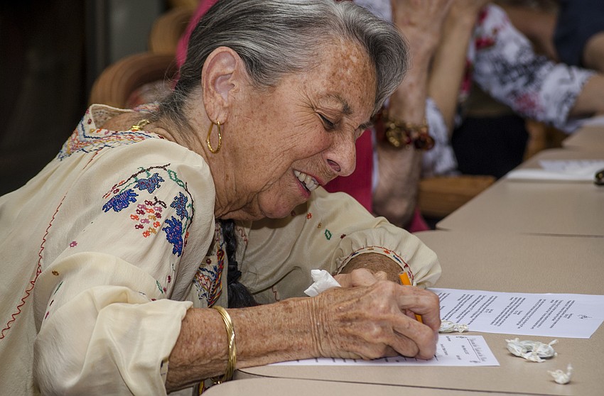 Donna Birnbaum participates in the name that tune game.