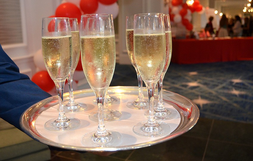 Servers greeted guests with champagne upon arrival at the 29th Annual Girls Inc. Celebration Luncheon: Girl Power on March 31 at The Ritz-Carlton, Sarasota.