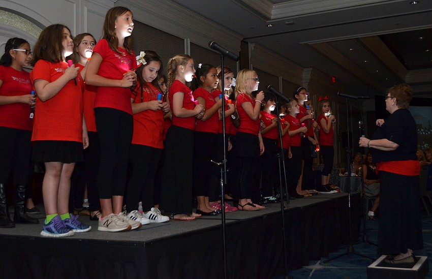 Members of the Girls Inc. of Sarasota County choir perform Hailee Steinfeld’s “Flashlight” for guests at the 29th Annual Girls Inc. Celebration Luncheon: Girl Power on March 31 at The Ritz-Carlton, Sarasota.