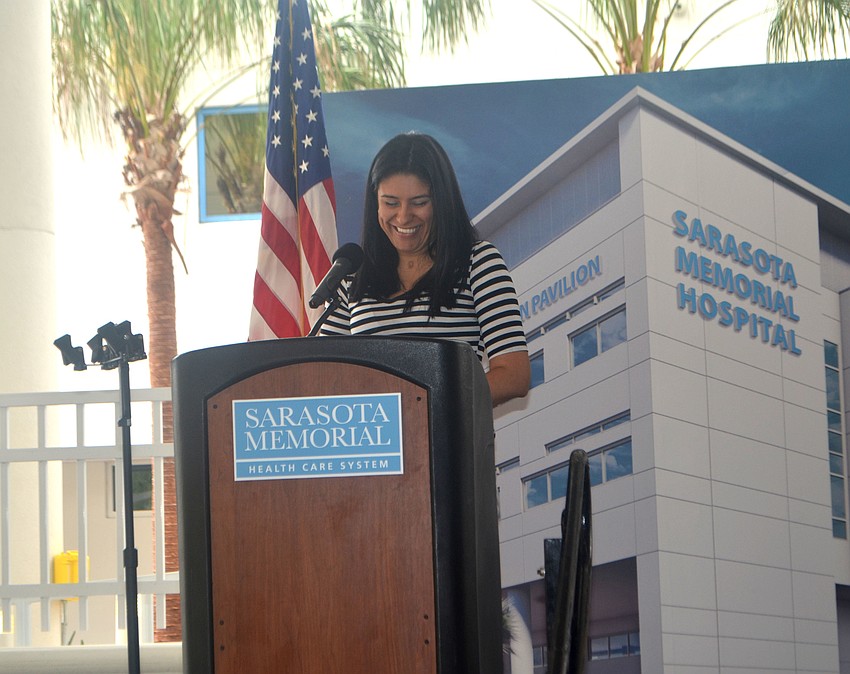 Ana Gonzalez shares her story with Sarasota Memorial Hospital supporters at the grand opening of the Rehabilitation Pavilion on April 1. Gonzalez was in a coma for four months and did rehab with the health care system.