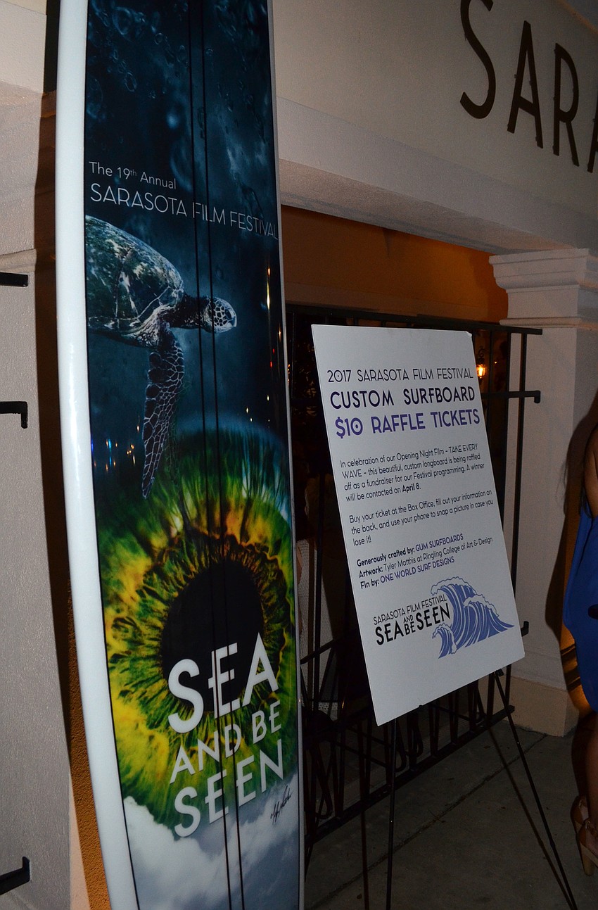 A custom surfaced covered with the Sarasota Film Festival logo was part of the raffle at the event on March 31 outside the Sarasota Opera House.