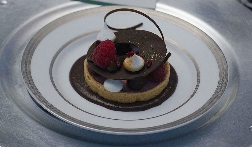 Dessert, a chocolate raspberry tart, is served at Firefly Gala on April 1 at The Ritz-Carlton Members Golf Club.