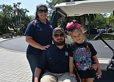 Army Staff Sergeant Carl Moore, along with his wife, Heather, and daughter, Addison, can' t believe the hospitality shown by Rosedale residents.