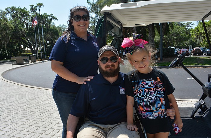 Army Staff Sergeant Carl Moore, along with his wife, Heather, and daughter, Addison, can' t believe the hospitality shown by Rosedale residents.