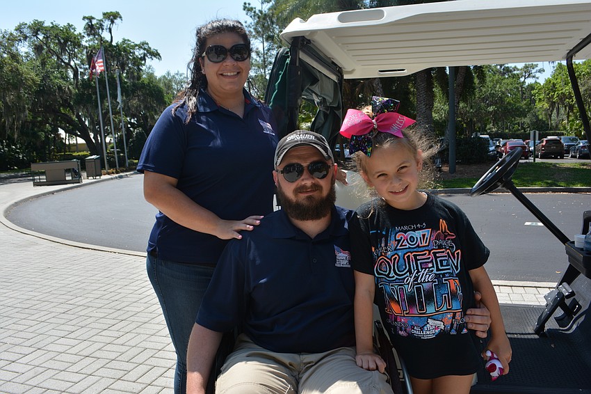 Army Staff Sergeant Carl Moore, along with his wife, Heather, and daughter, Addison, can' t believe the hospitality shown by Rosedale residents.