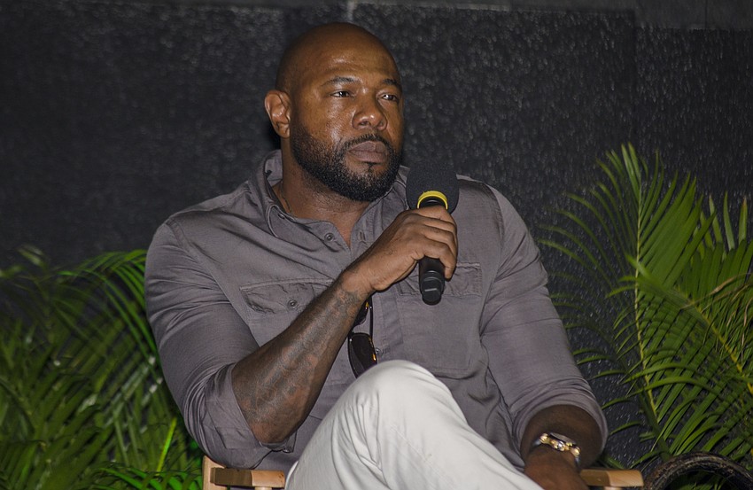 Director Antoine Fuqua participates in a Q&A after the ribbon cutting ceremony.