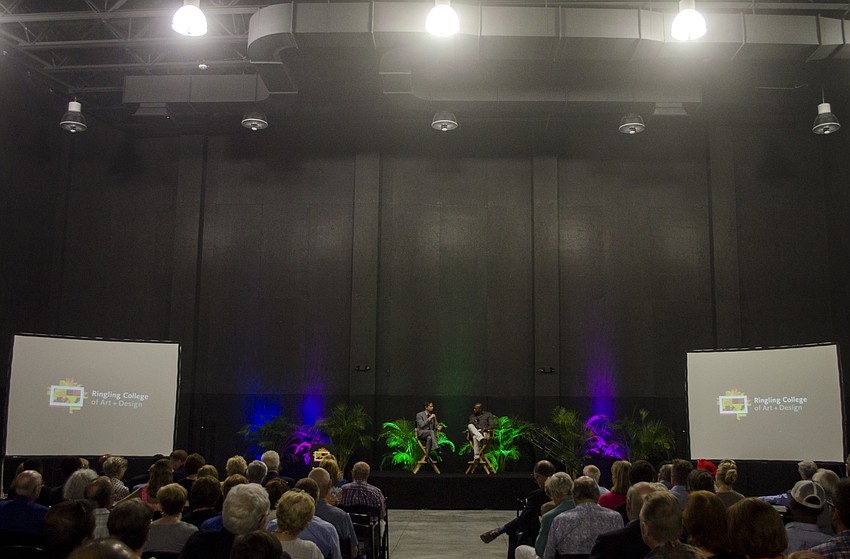 Director Antoine Fuqua participates in a Q&A after the ribbon cutting ceremony.