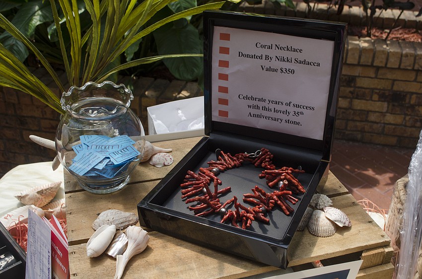 Nikki Sedacca donated a coral necklace as a raffle prize for the nautical-themed Magic on the Bay on April 4 at Michael’s On East.