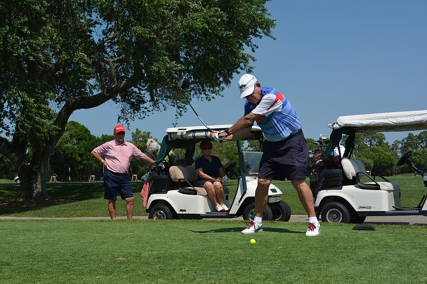 Rosedale' s Mike Matthews unleashes a shot during the tournament.