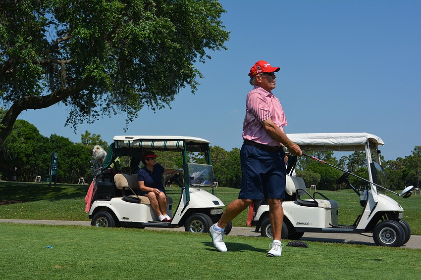 Bob Wilhelm watches his drive go right down the middle.