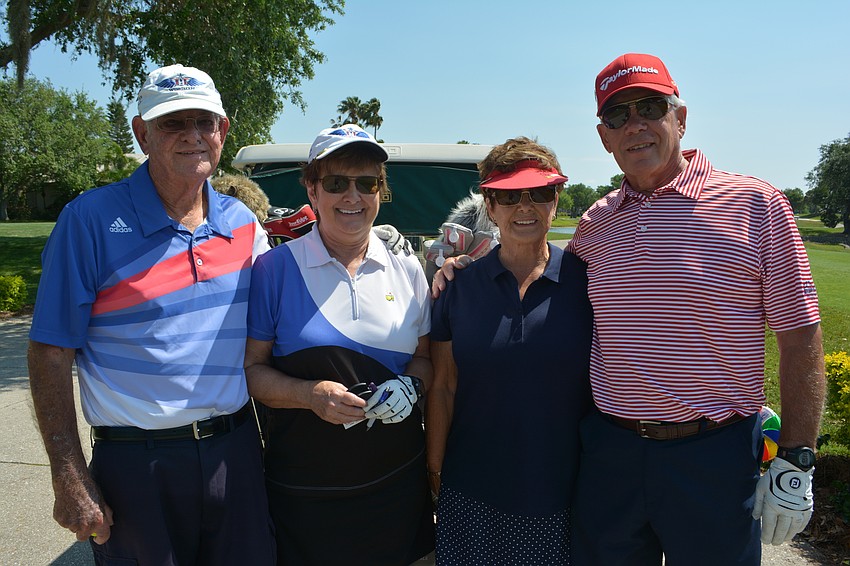Mike and Joyce Matthews and Carol and Bob Wilhelm turned out to support the disabled vets.