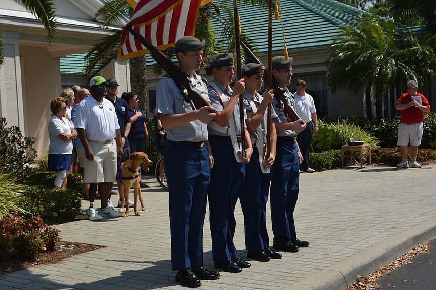 Freshman Camrin Suggs, senior Kaley Gee, junior Alexander Fallacaro and senior Tom Fraser of Lakewood Ranch High JROTC program present the colors.