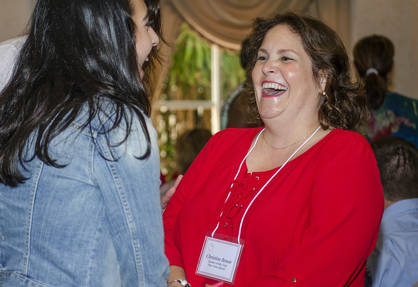 Sarasota County Teacher of the Year finalist Christine Braun chats with fellow Teacher of the Year luncheon guests.