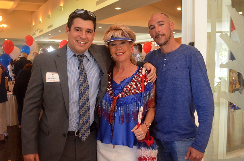Veteran Bill Sterbinsky, Joanne Forche and veteran Edward Cacciola