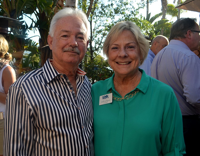 Commissioner Jim Brown and Chamber President Gail Loefgren