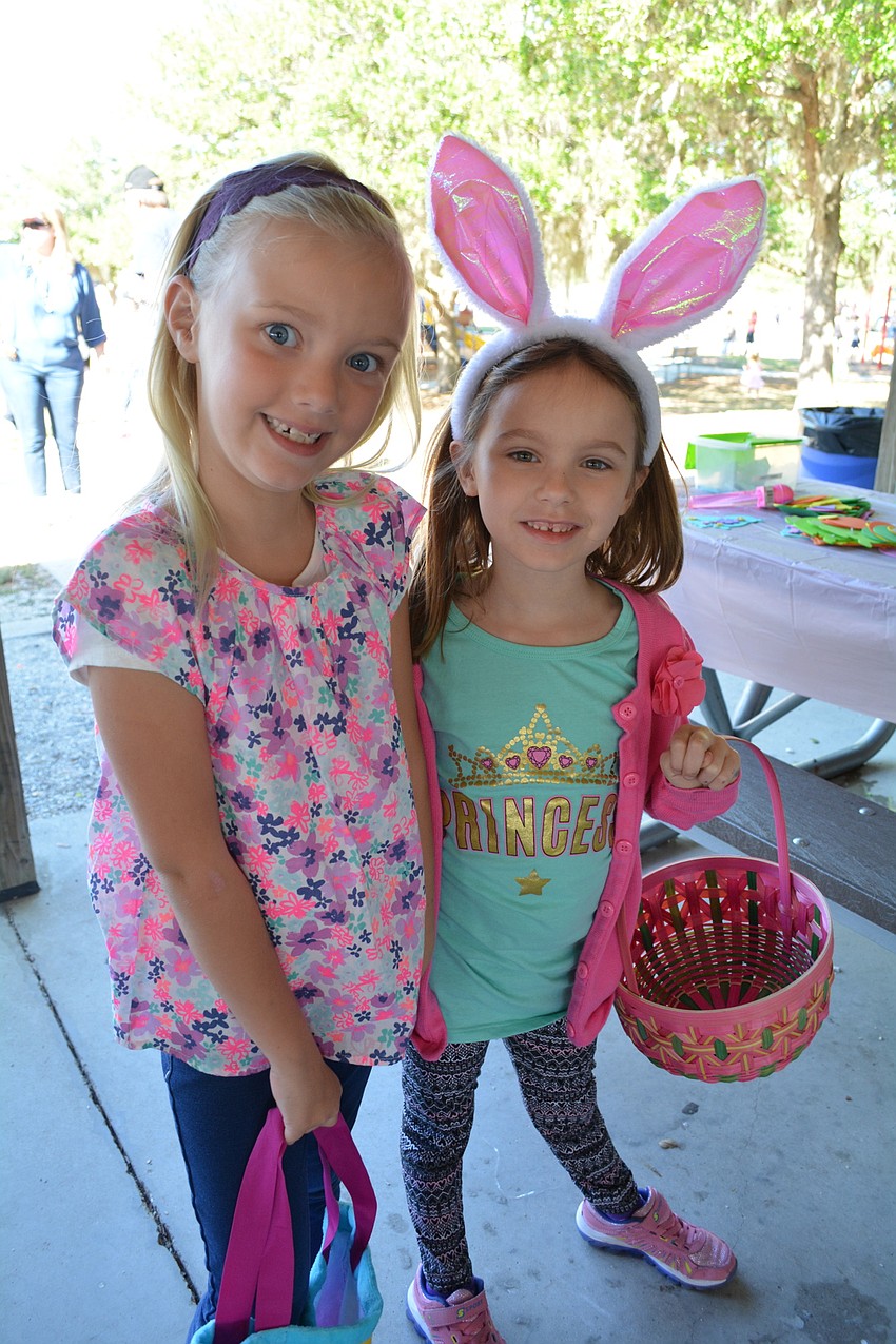 Six-year-olds Olivia Drobney and Aubrey Jenkins, of Lakewood Ranch, make sure to hunt together.