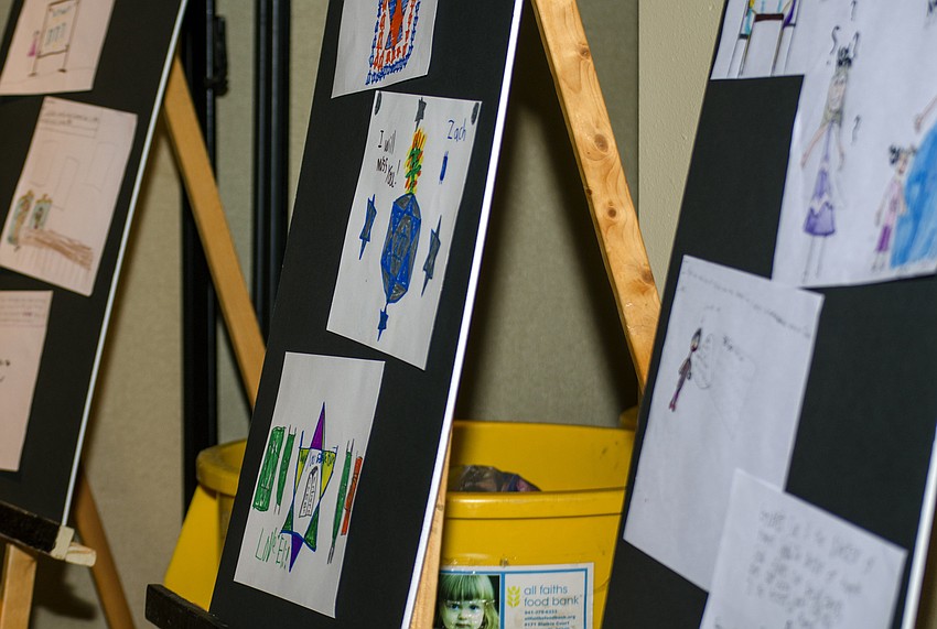 Pictures created by Religious School students were displayed near the entrance of the event.