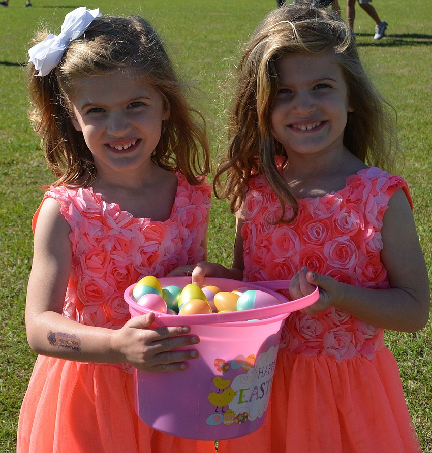 Twins Blaire and Blakely Ross of Atlanta filled their basket while on a trip to see grandparents Brad and Shaun Seymour of Lakewood Ranch.