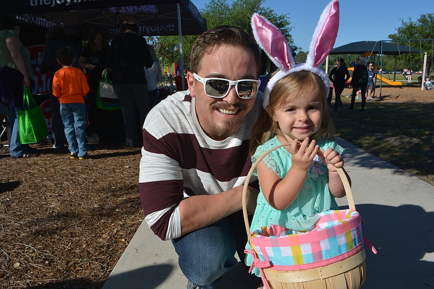 Lakewood Ranch' s Bixby Hartley and his daughter, Brynleigh, 2, are ready to hunt for eggs.