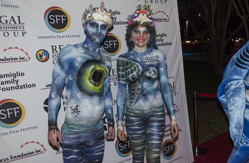 Models in Sarasota Film Festival body paint pose on the red carpet at Sea and Be Scene on April 7 at J.D. Hamel Park.