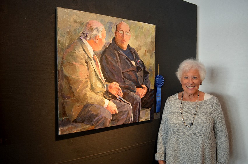 Marjorie Sayer with her first-place piece, “Taomina Talks”