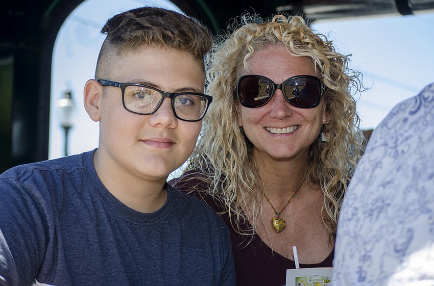 Oliver Koch and Jennifer Ahearn-Koch wait to take a trolley tour around Newtown.