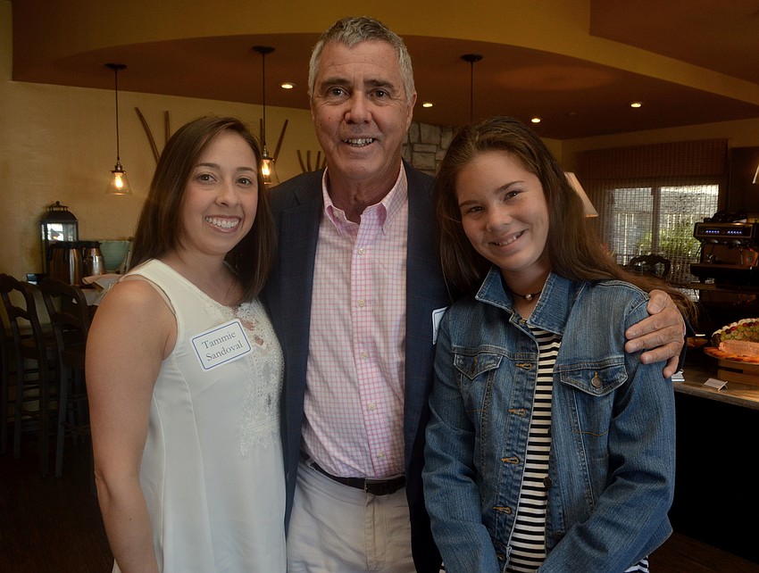 Tammie Sandoval, JFCS Board Chairman Steve Seidensticker and Olivia Seidensticker