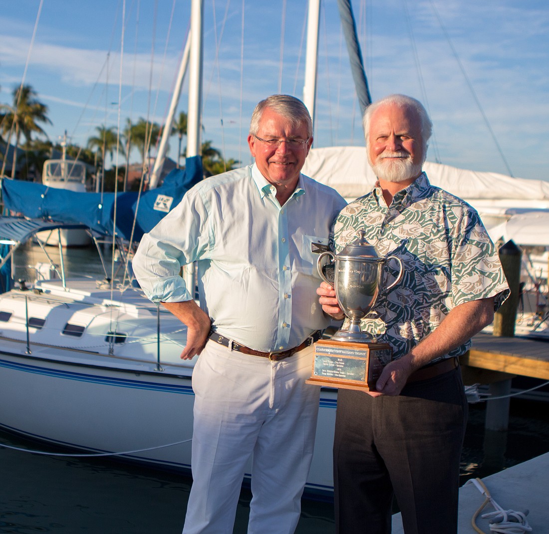 Bird Key Yacht Club Commodore Charlie Wilson and Mote President and CEO Michael Crosby