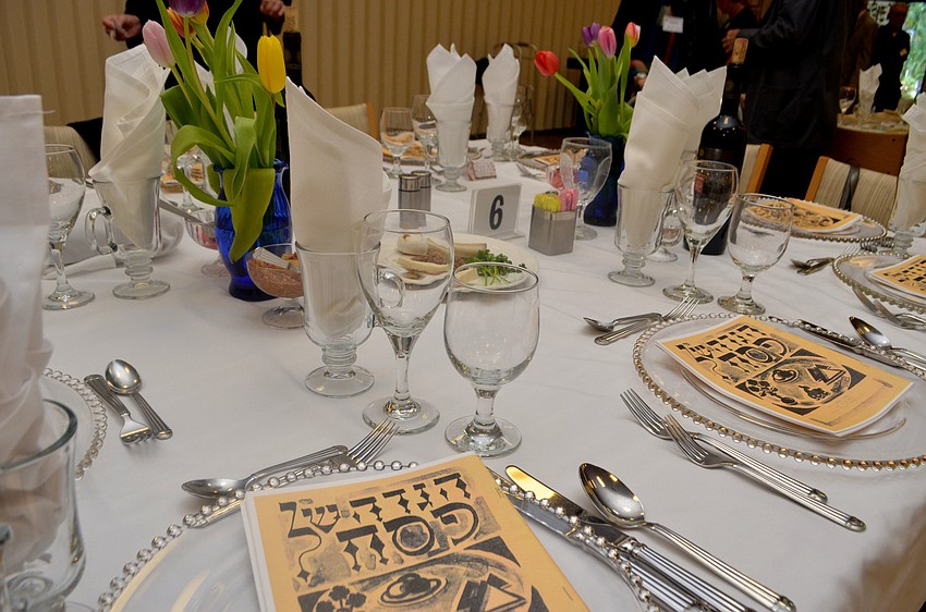 Tables were adorned with tulips during the Temple Beth Israel Passover Seder.