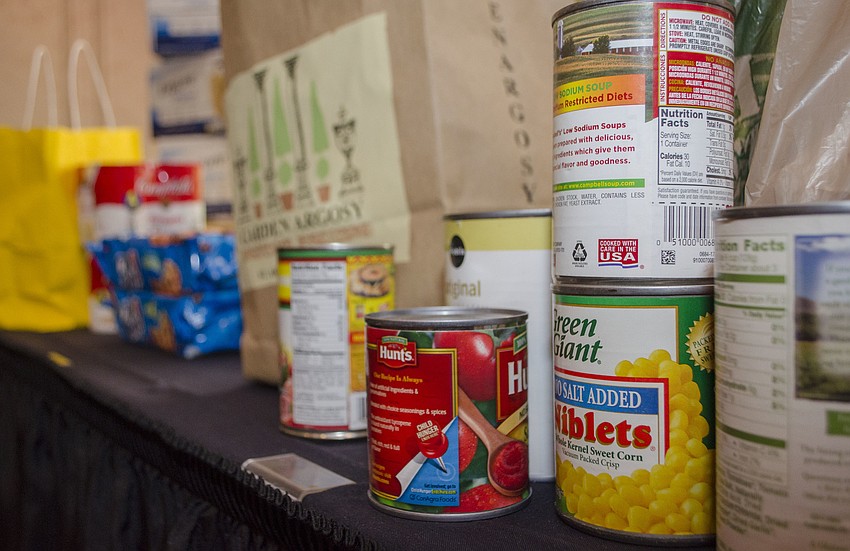 Guests brought non-perishable food items to donate to All Faith Food Bank at the April Showcase Luncheon on April 10 at Michael’s On East.