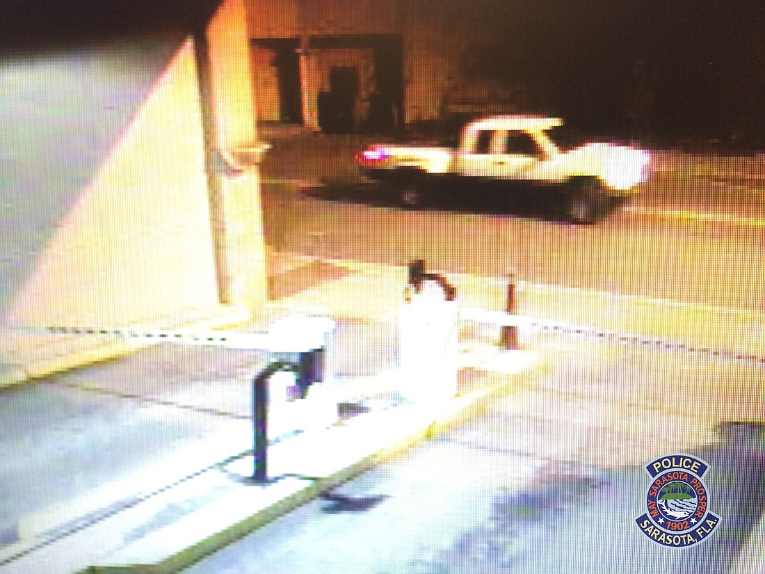 Sarasota Police are searching for a white Chevy Silverado with left-front quarter panel damage in connection with a downtown hit-and-run incident.