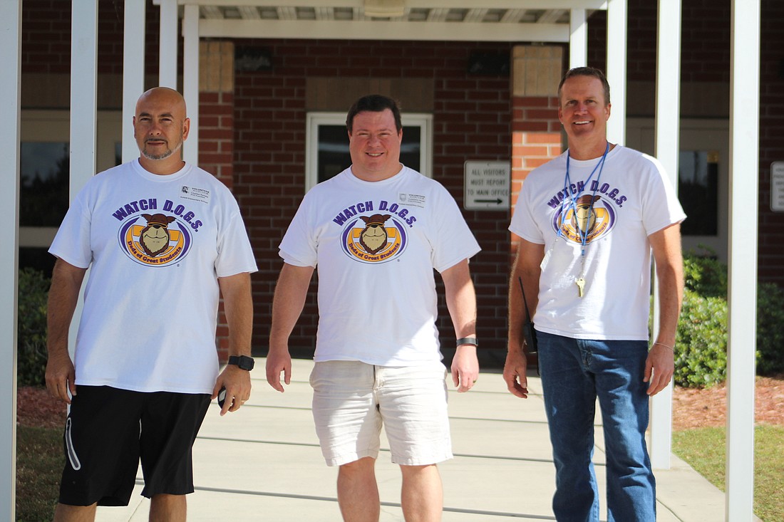 Gullett Elementary Watch DOGS Charles Kersey, Chris Brown and Randy Cody walk the halls. They provide extra security and perform any tasks asked of them by the administration or teachers.