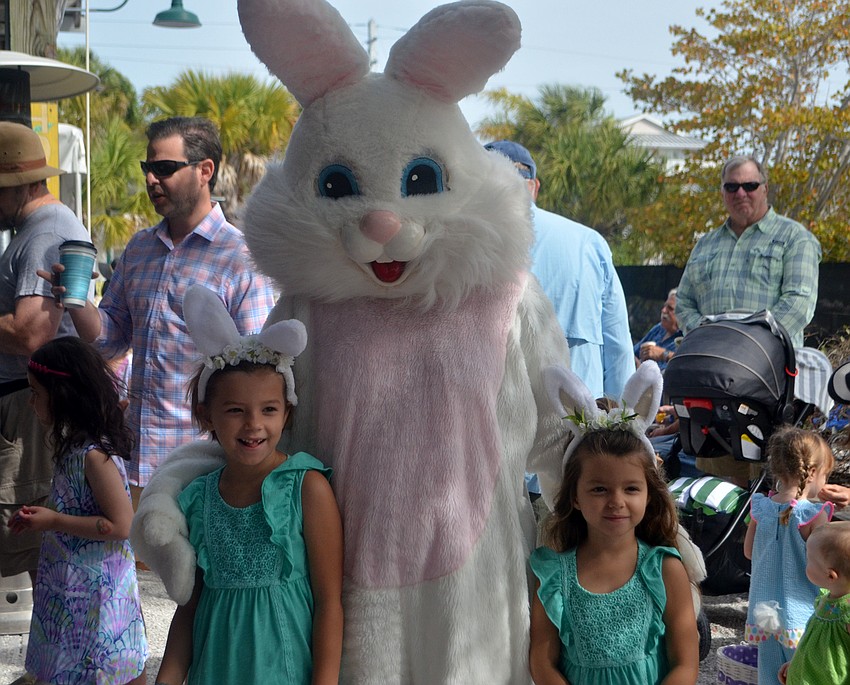 Mila and Mora Muise pose with the Easter Bunny.