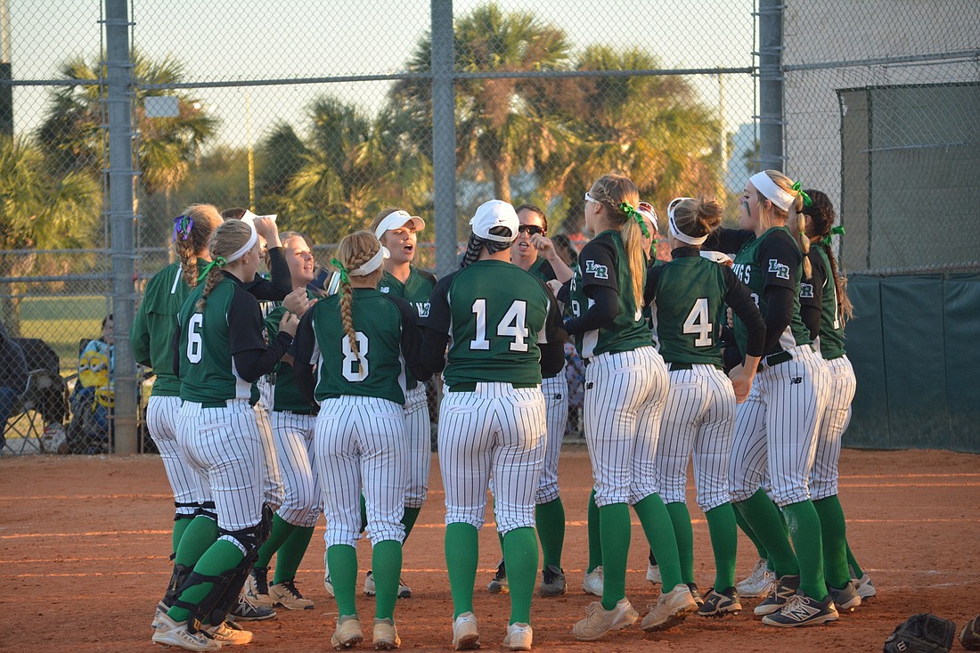 The Lakewood Ranch softball team danes before a game against Braden River.