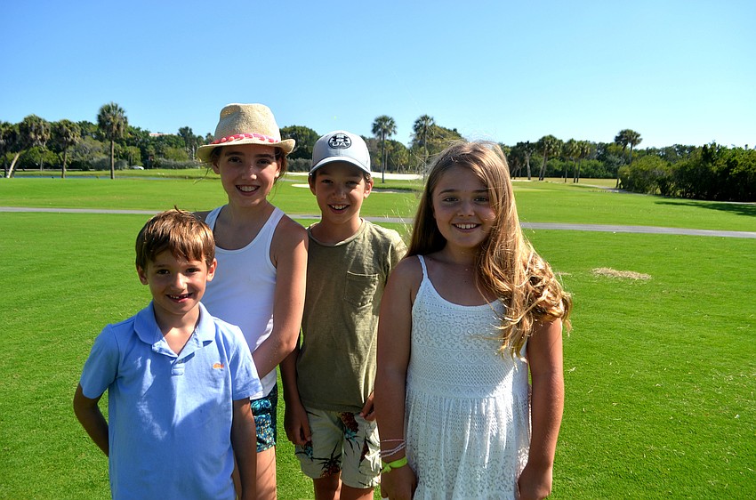 Wilfred, 6, Martha, 10, and Henry Laurence, 9, with Alexa Gettel, 10