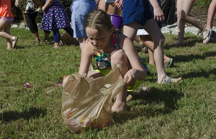 Mia Donnelly searches for candy at the Casa Del Mar Beach Resort Easter egg hunt on April 16 at Casa Del Mar.