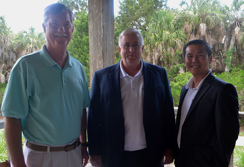 Steve Branham and Michael Renick and Eric Teoh of Michael J. Renick & Co./ Mangrove Realty Assoc. Inc.