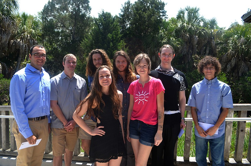 Scholarship recipients Matt Matia, Robert Benedict, Jay McWilliams, Brooklyn Wilhelm, Orion Morton, Chelce Shire, Alexander McClure and Zach Zildjian
