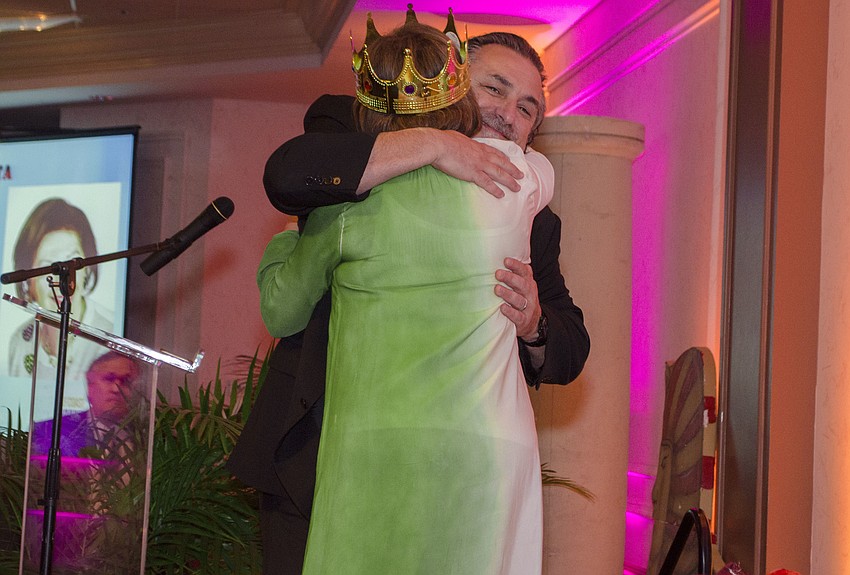 Phil Mancini embraces Renee Hamad after sharing a story about their friendship during the Sertoma Sarasota Celebrity Roast on April 18 at Michael’s On East.