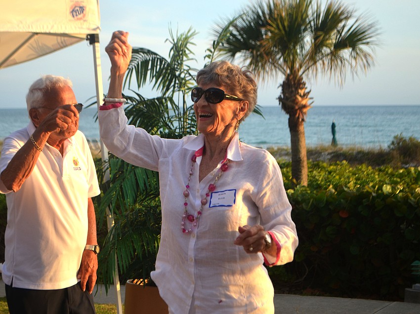 Sonja Ellis is all smiles as she dances to BC Hathaway'  s rendition of “Margaritaville.”