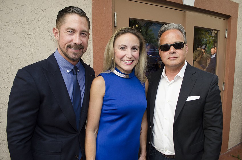Dan and Nicole Starostecki with Frank Duran