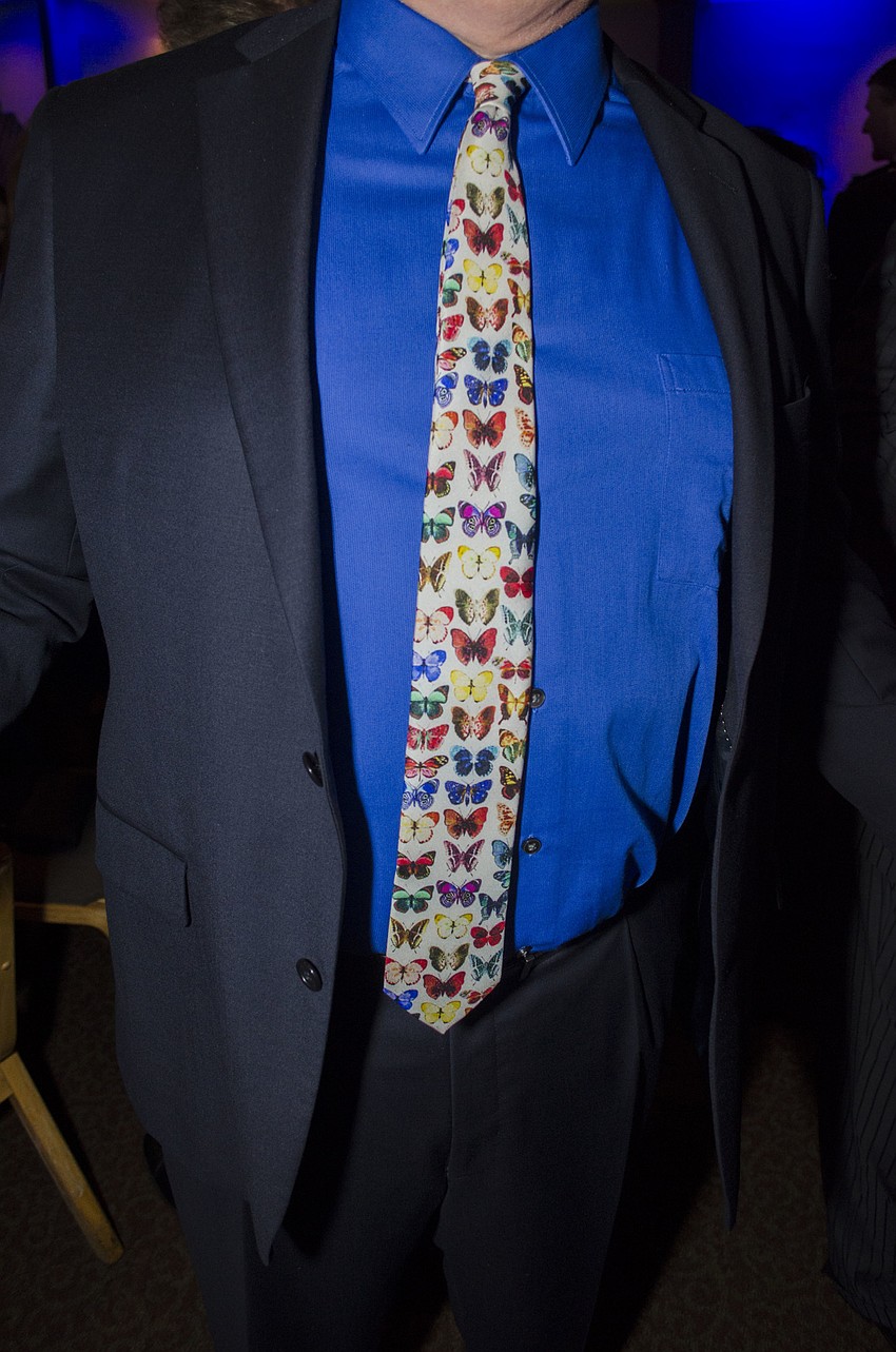 David Koffman shows off his tie at Blue Ties and Butterflies on April 19 at Michael’s On East.