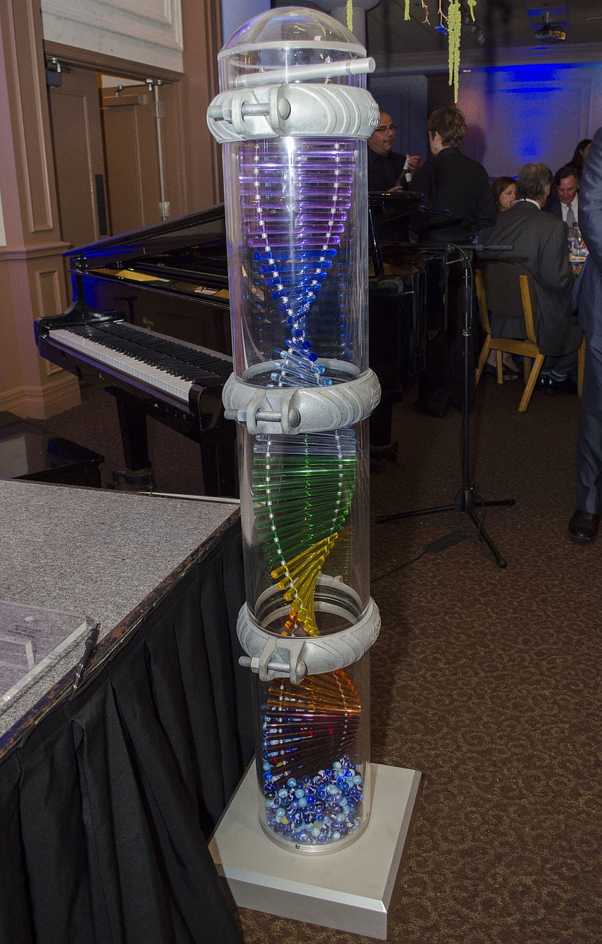 Guests got to place marbles in the mini pillar of hope, the symbol of Child Protection Center, at Blue Ties and Butterflies on April 19 at Michael’s On East.