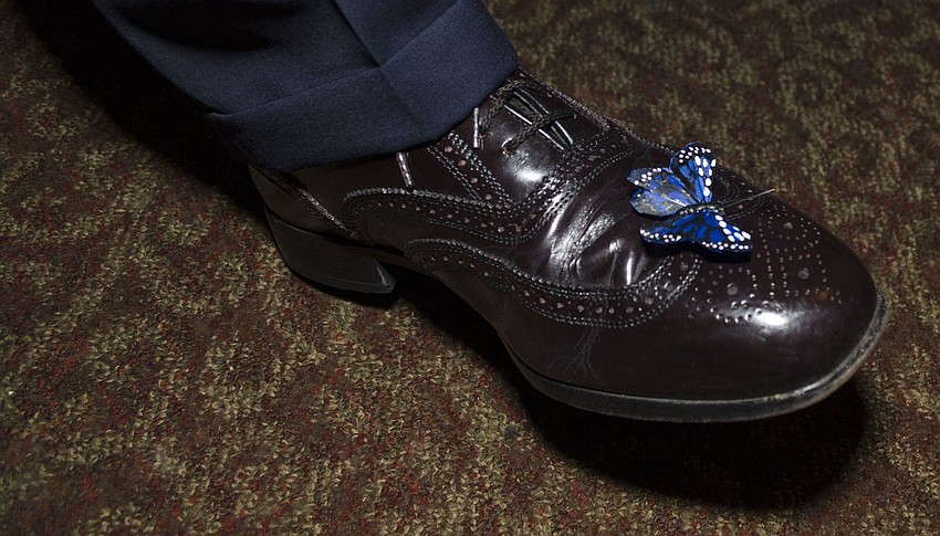 CPC Executive Director Doug Staley shows off the butterfly on his show at Blue Ties and Butterflies on April 19 at Michael’s On East.