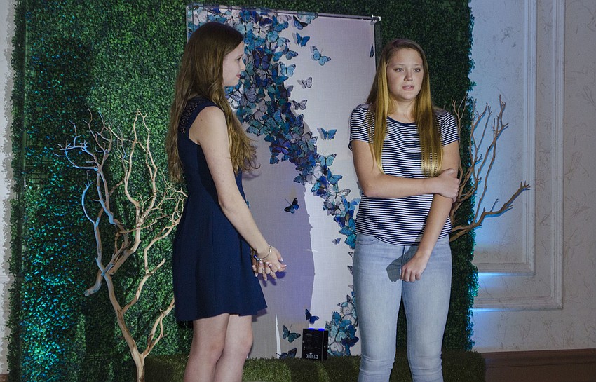 Young supporters of Child Protection Center act in a skit depicting an actual family scenario that one CPC child was taken out of — one of several skits that took place during Blue Ties and Butterflies on April 19 at Michael’s On