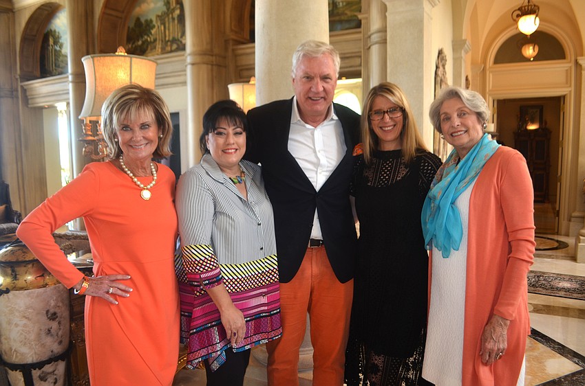 Mary Kelly, Jane Gowarty and Bob Glaser of Smith and Associates Real Estate, Stephanie Anton of Luxury Portfolio International and Michael Saunders