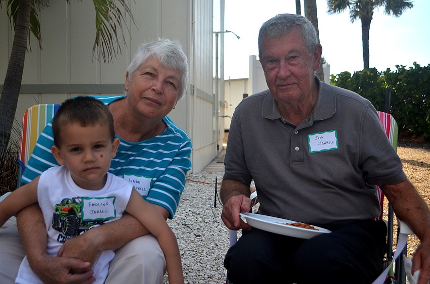 Emerson Jarrell, 4, with grandparents Linda and Jim Jarrell