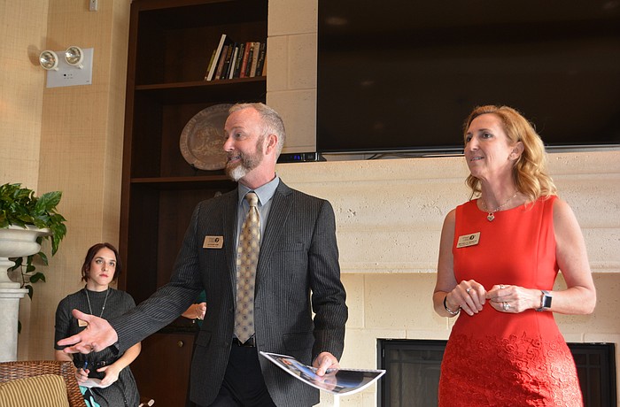 Jeffery Kin and Michelle Bianchi of The Players Centre update a meeting of  the theater'  s "ambassadors'   about the progress being made toward moving to Lakewood Ranch.